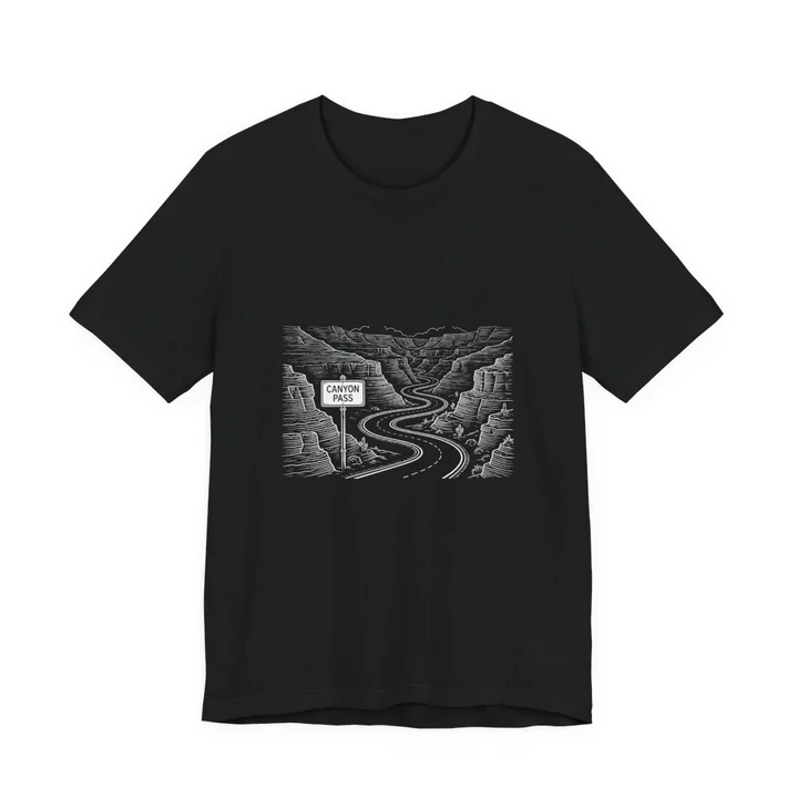 Canyon Pass Route Sign Tee mockup: the print on a black Bella+Canvas 3001 tee